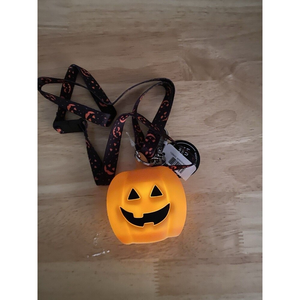new Bath & Body Works pumpkin light up Pocket sanitizer  Holder w Lanyard
